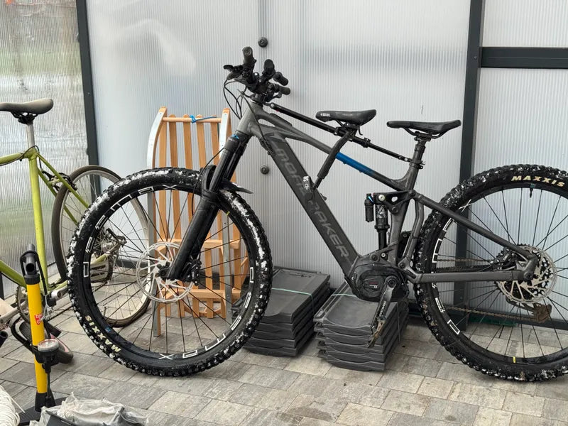 Black mountain bike indoors